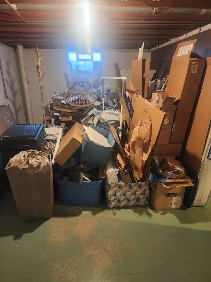 Roll-off dumpster container at job site for Cleanout Dumpster Rental in Taymouth